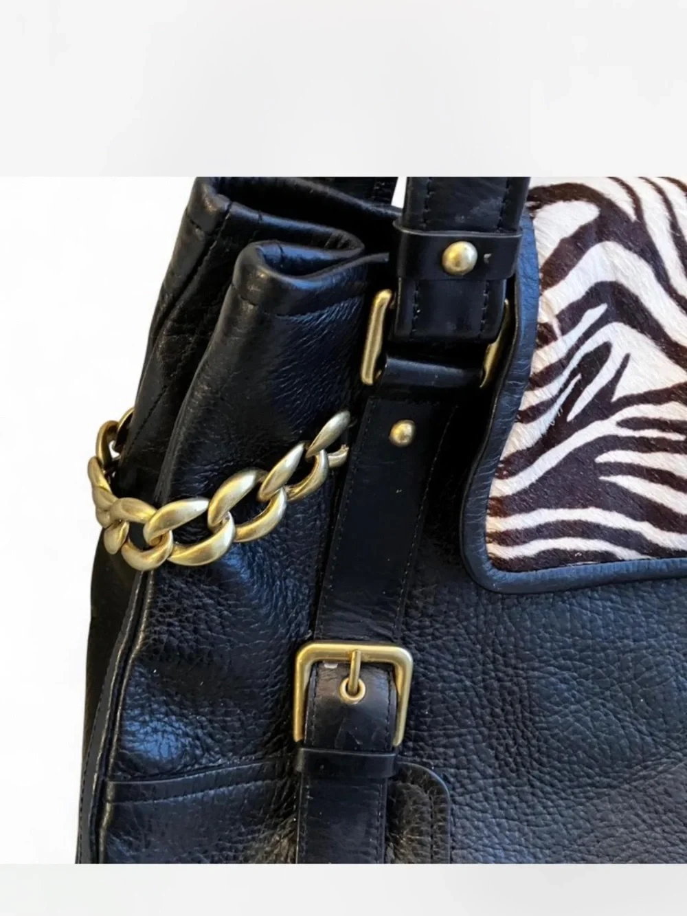 Kenneth Cole Black Shoulder Bag with Zebra-Print Flap and Gold Hardware Accents
